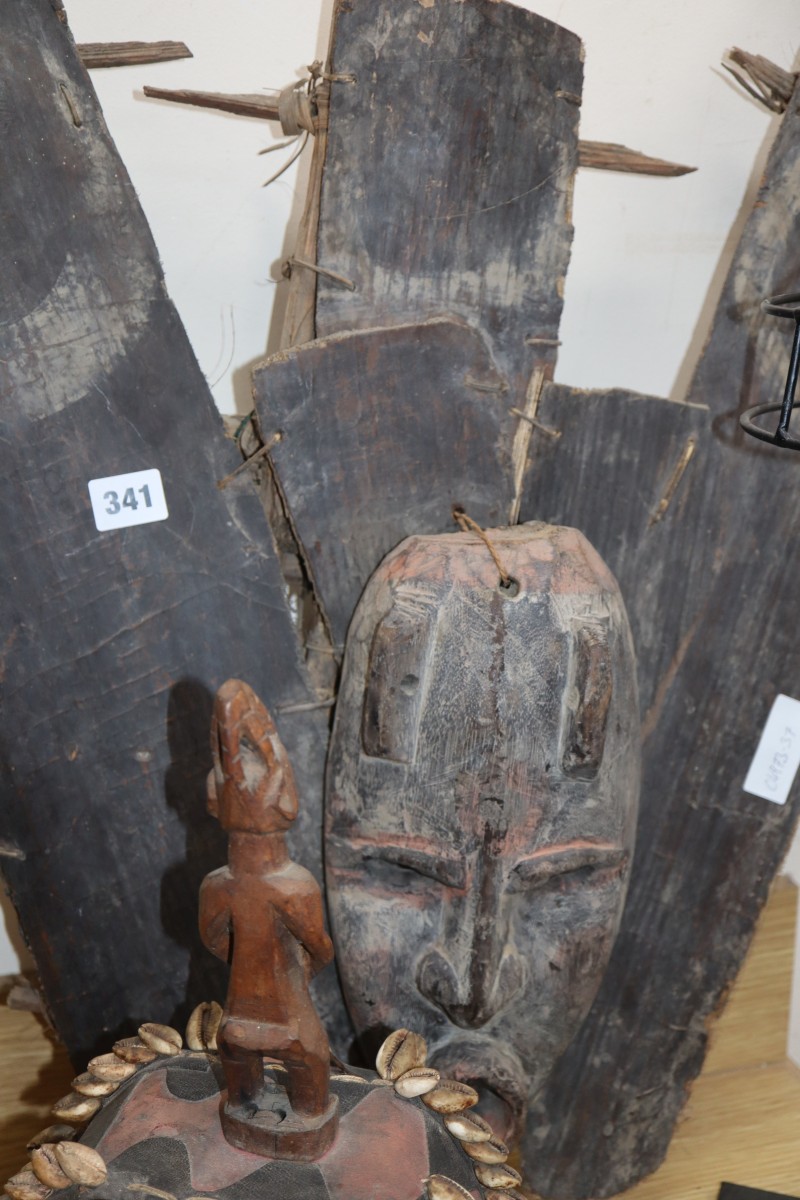 A collection of African carvings, Yoruba etc, largest 98cm